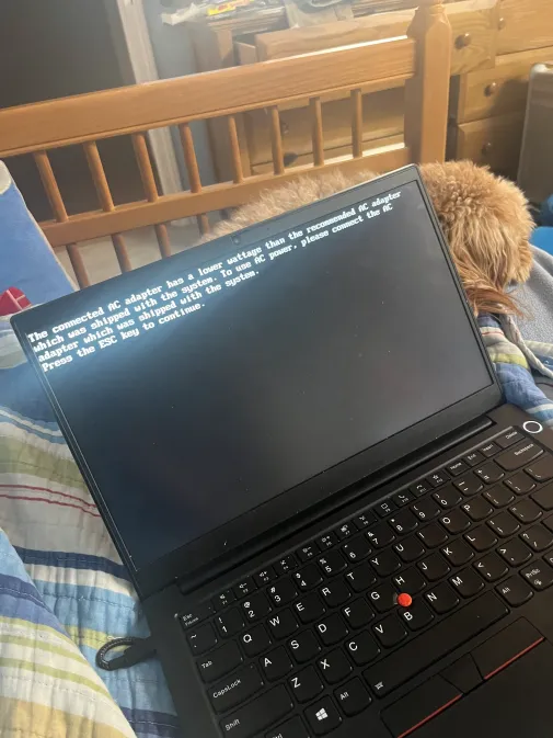 Lenovo ThinkPad showing a warning explaining it is not receiving enough power from the AC adapter